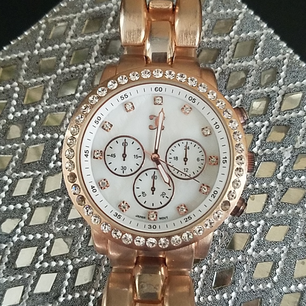 Rose gold large faced ladies watch